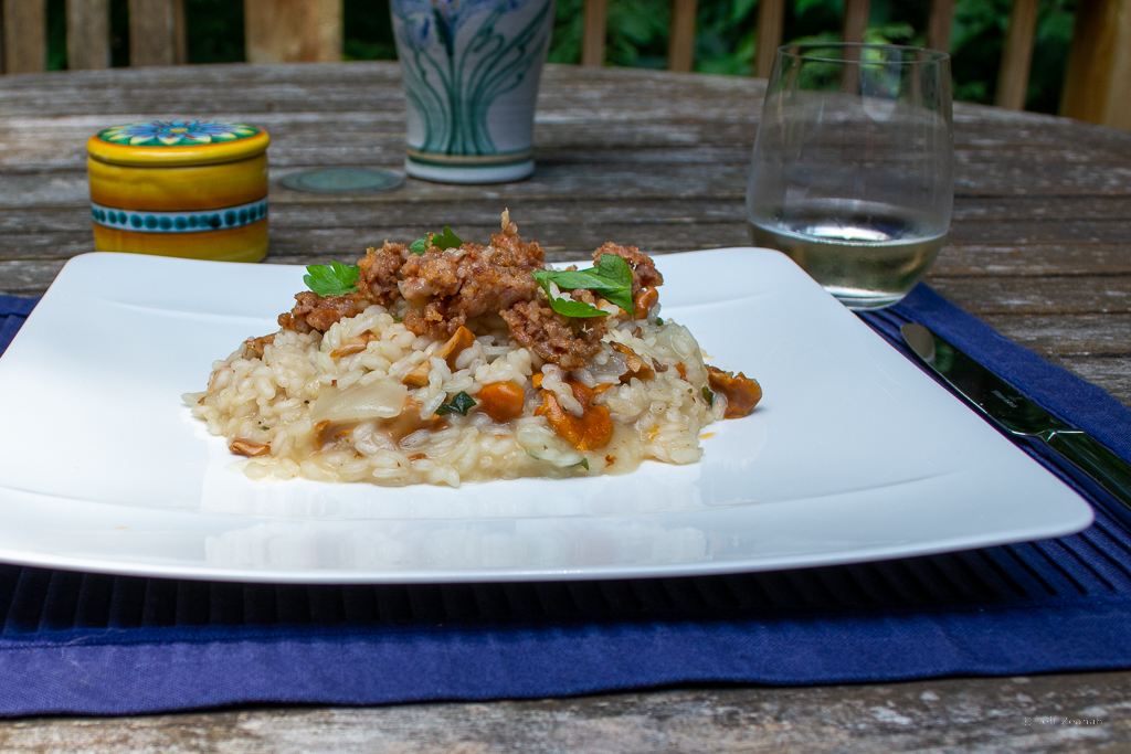 chanterelle risotto with a glass of wine