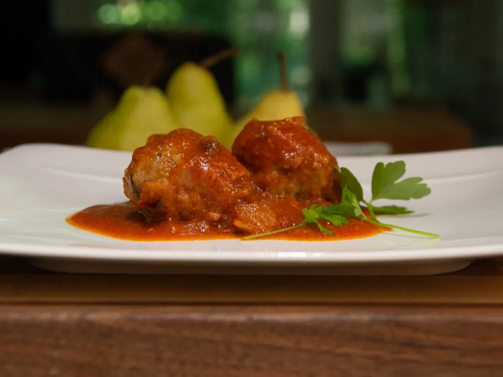 Plated tomato sauce meatballs