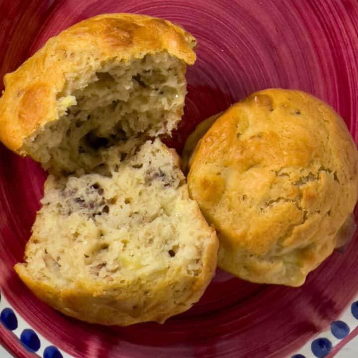 Easy Banana Bread Muffins torn open on Plate
