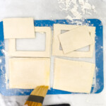 Using eggwash Brush the edges